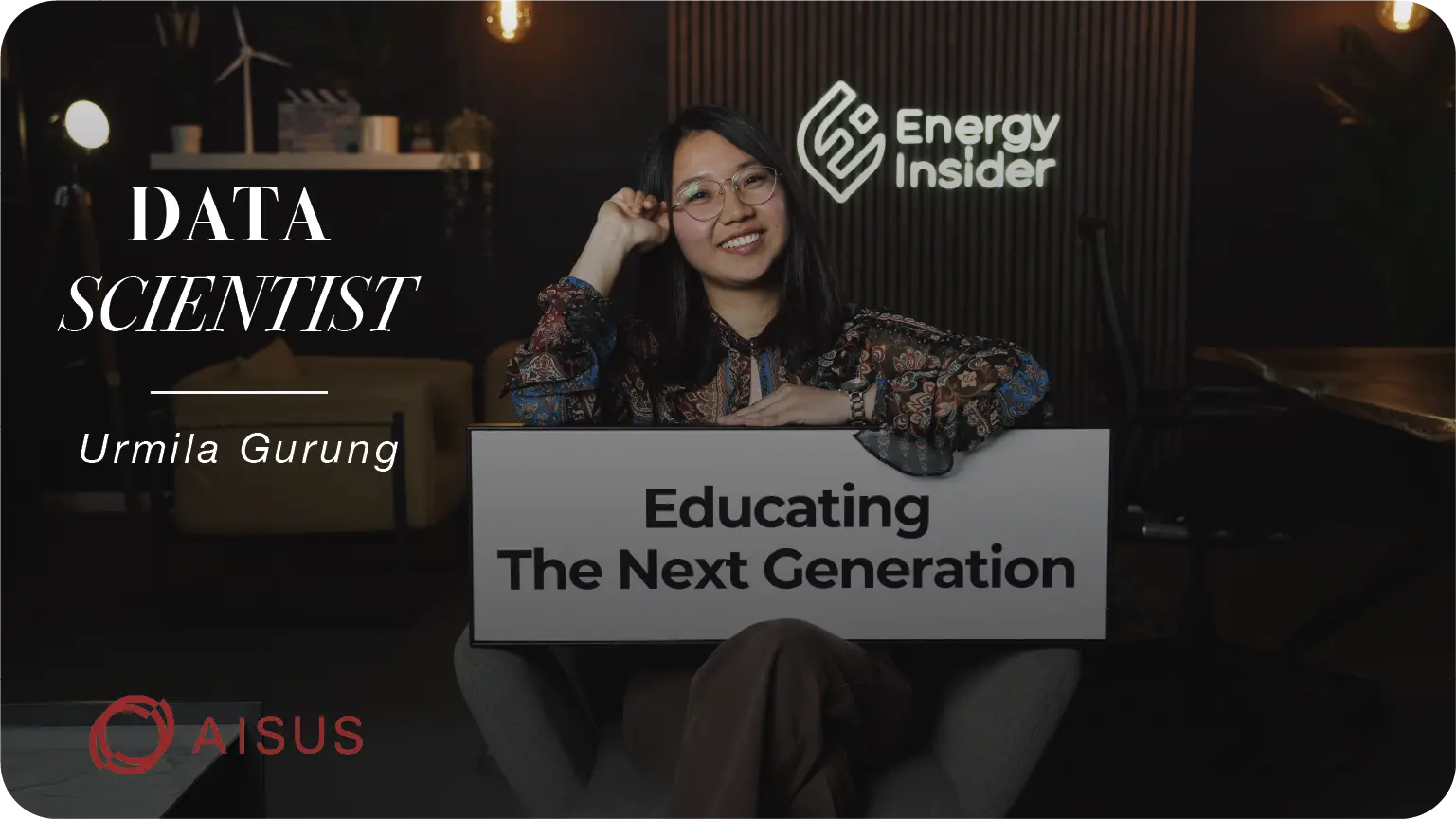 A data scientist is smiling at the camera