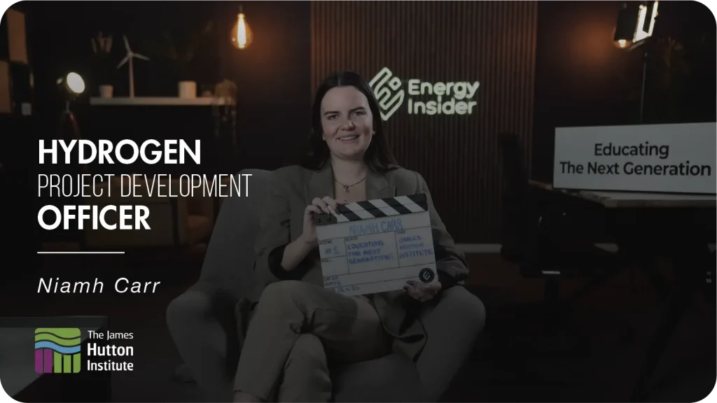 Hydrogen specialist female sitting smiling